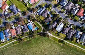 Overhead view of houses, backyards and streetscape