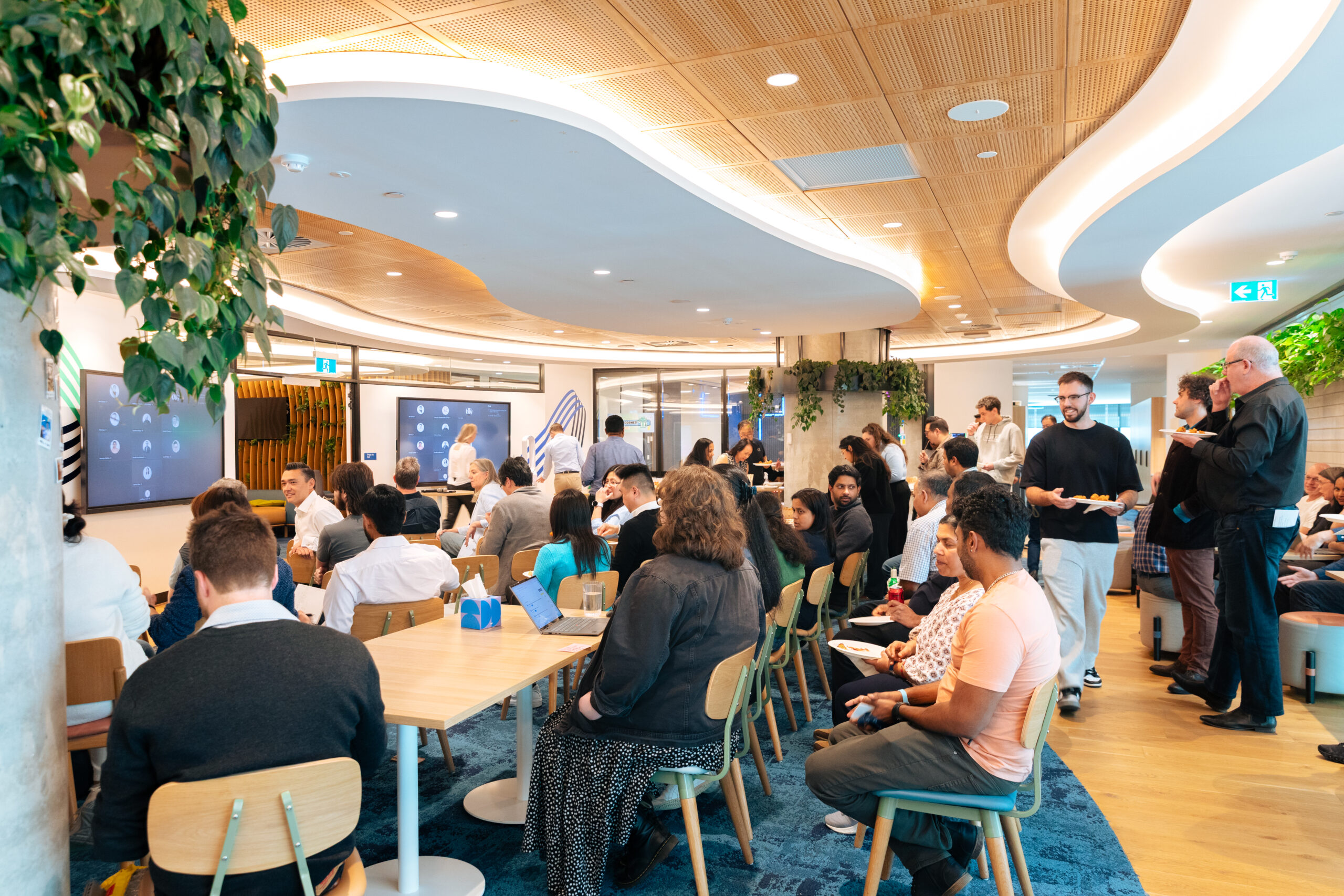 People collaborating in SERV's office